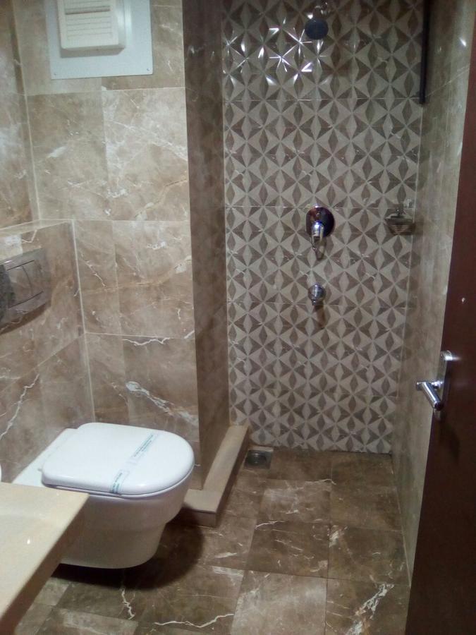 Lalitha Inn กูรูวาเยอร์ ภายนอก รูปภาพ